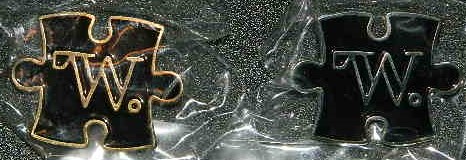 Gold and Silver "W" pinsPuzzle Nakatomi kickstarter